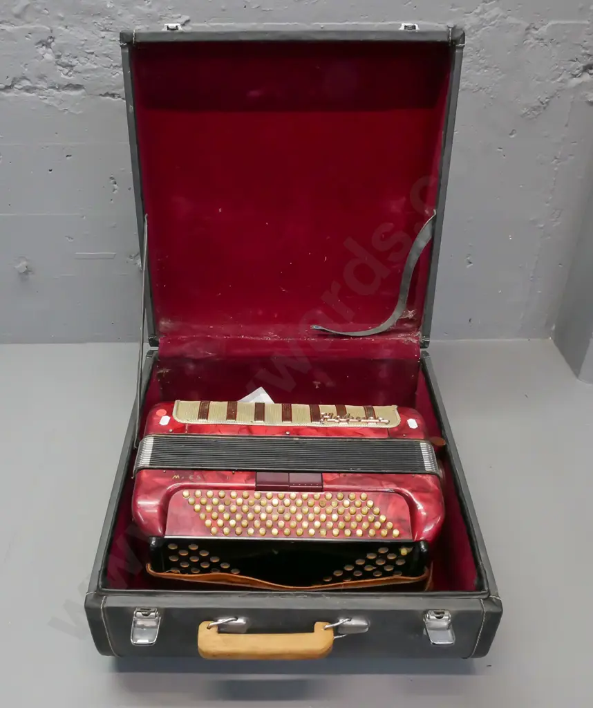 cased Hohner Maestro II button accordion, has one missing button. Wear to leather strap, overall wear and some corrosion Image 1++