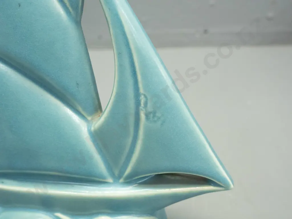 deco Sylvac-style blue ceramic yacht with cork stopper in base, no maker's marks - has small glaze flaw / discolouration Image 1++