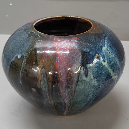 New Zealand studio pottery vase in multi-colour drip glaze, maker's mark R or RS? H-150 D-200