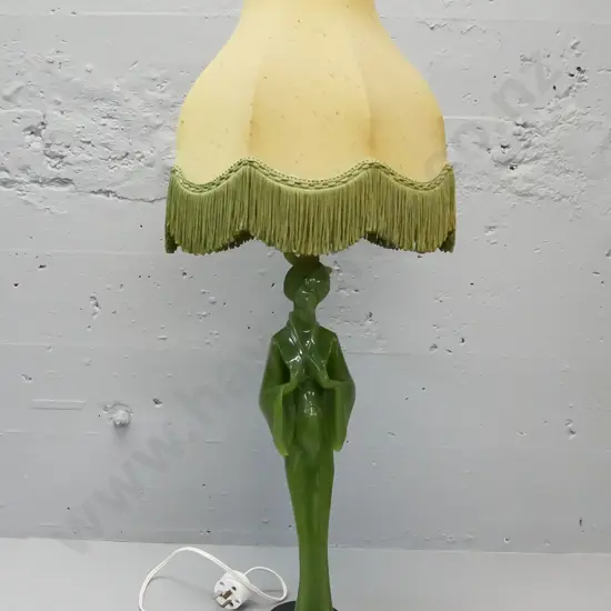 Table lamp by Marble Art NZ, composite Asian figure on shaped base with scrolling feet. Waisted frilled shade. Working.