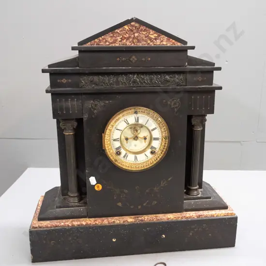 vintage Ansonia clock in black Belgian marble architectural style case with loose sitting pediment top, agate insets,
