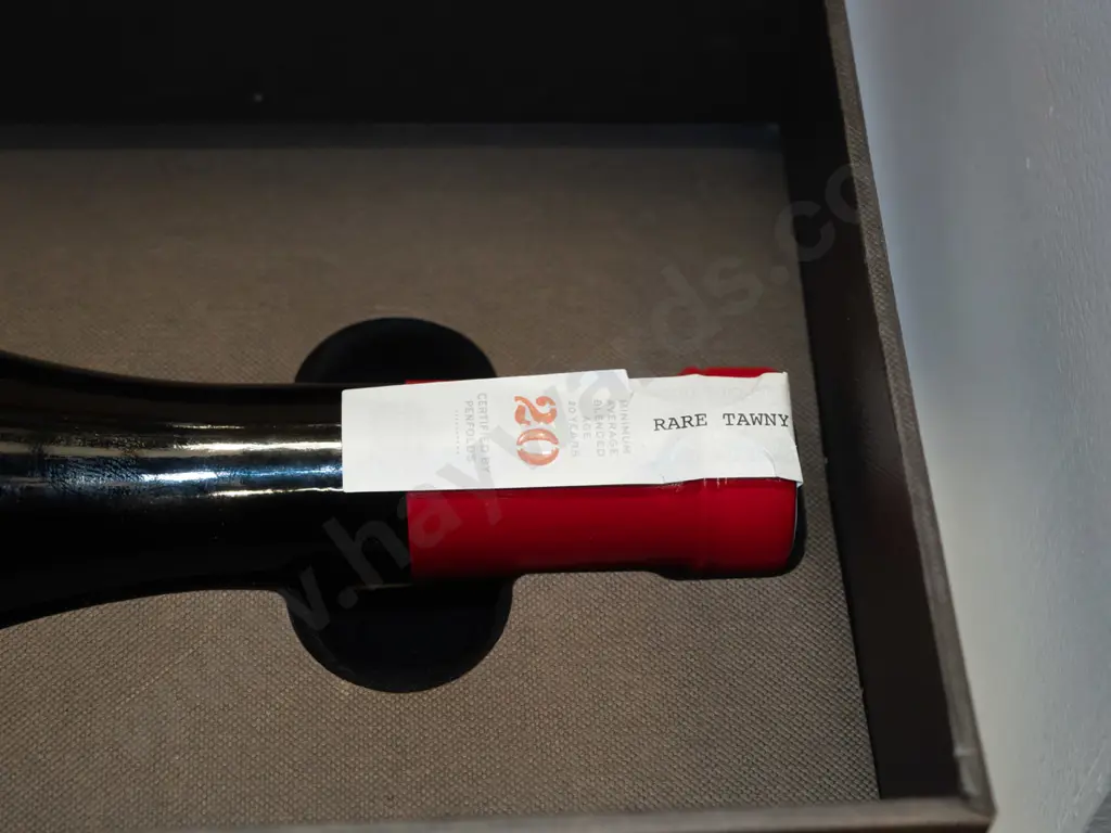 bottle of Penfolds Grandfather rare tawny 20 year old port in presentation case. Image 1++