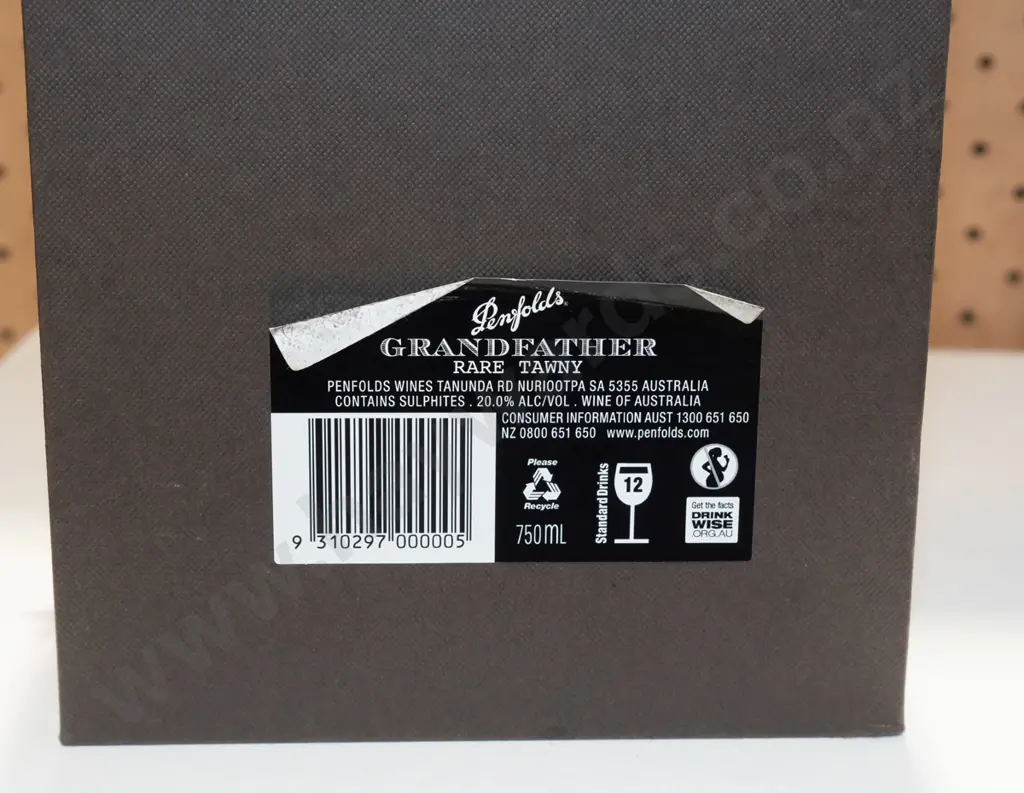 bottle of Penfolds Grandfather rare tawny 20 year old port in presentation case. Image 1++