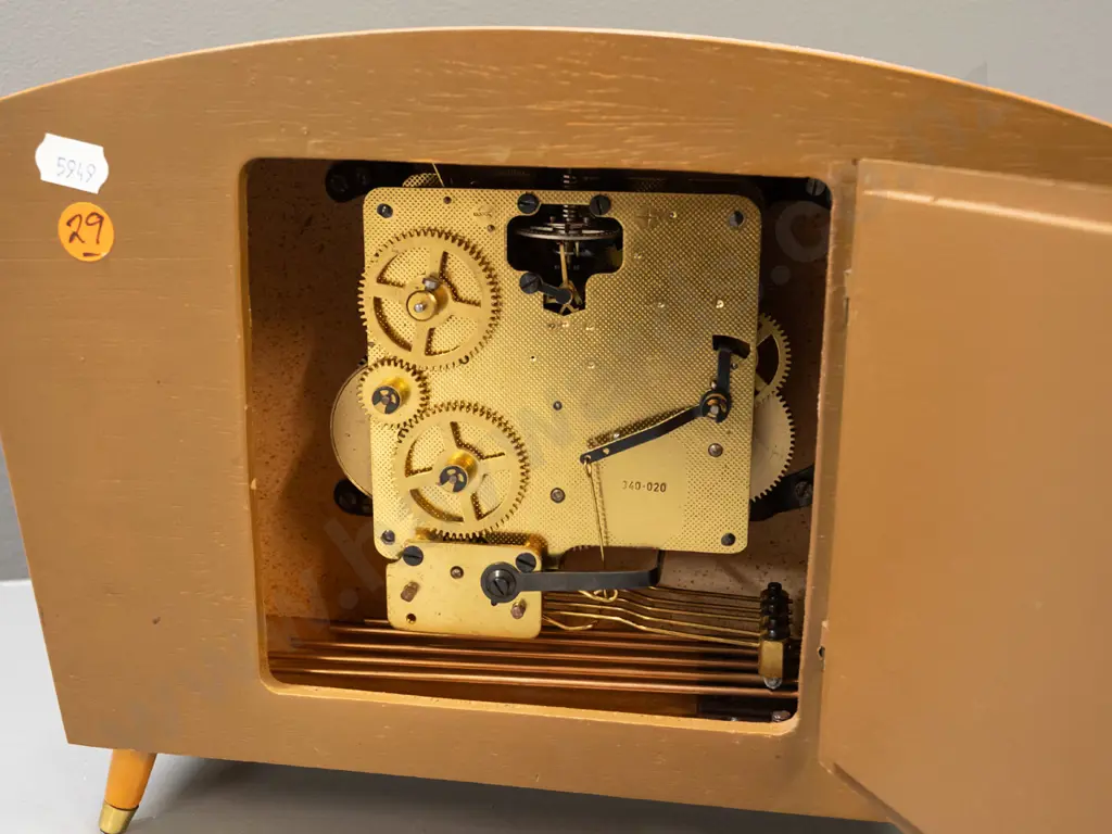 mid-century German Kieninger Schwebegang mantel clock on tapered feet with brass caps, boxwood stringing on edges, 1963 Image 1++