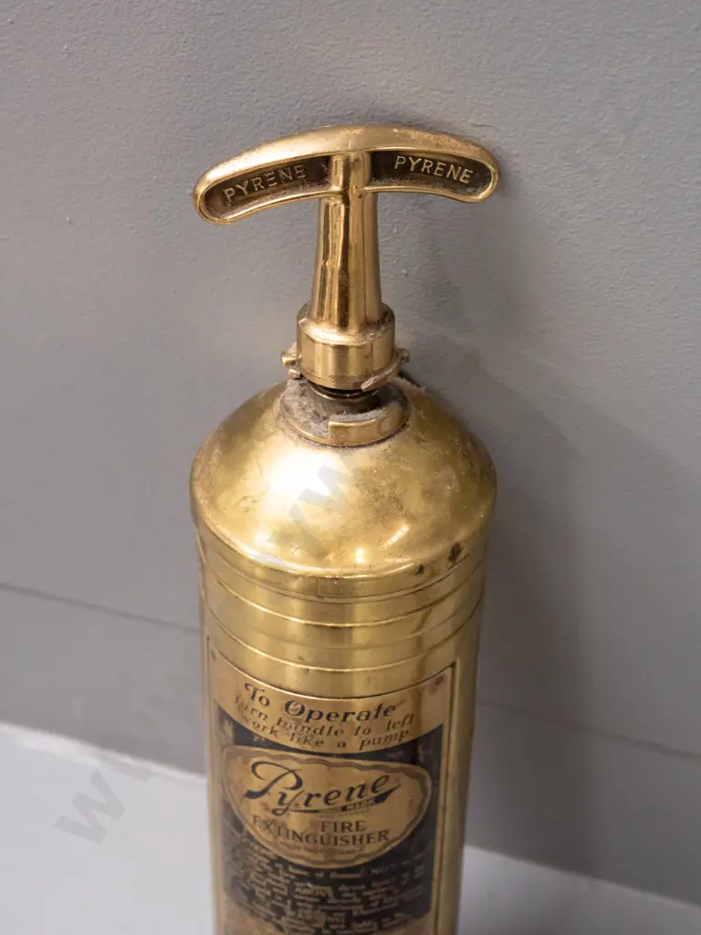 small brass hand-pump fire extinguisher - Pyrene Made in England, w/ Harrison's Ramsay NZ markings - minor denting L370 Image 1++