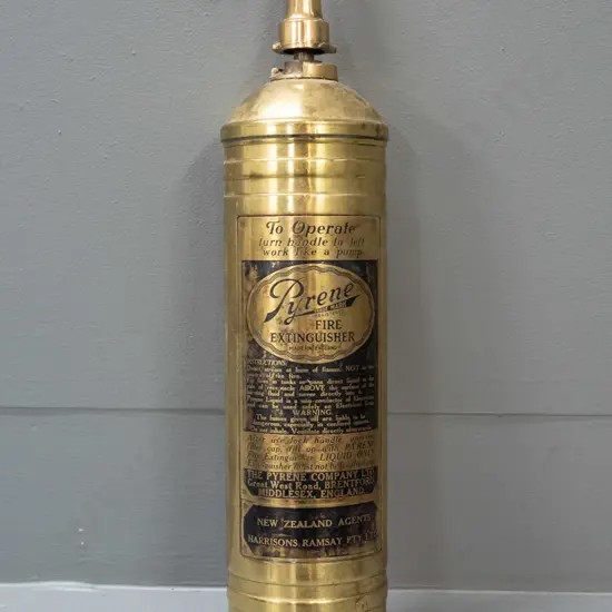 small brass hand-pump fire extinguisher - Pyrene Made in England, w/ Harrison's Ramsay NZ markings - minor denting L370