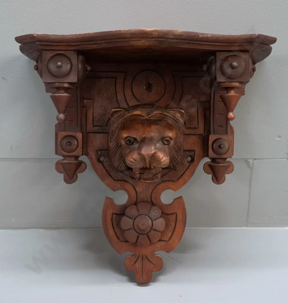 Victorian carved walnut and oak wall bracket with lion's head and flower, shaped top and brackets, drop finials - has Image 1++