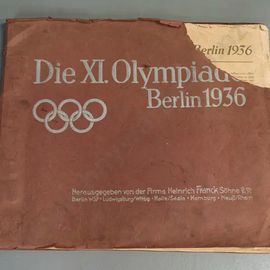 German collector card album from the 1936 Berlin Olympics - incomplete but numerous cards pasted in, some damage and