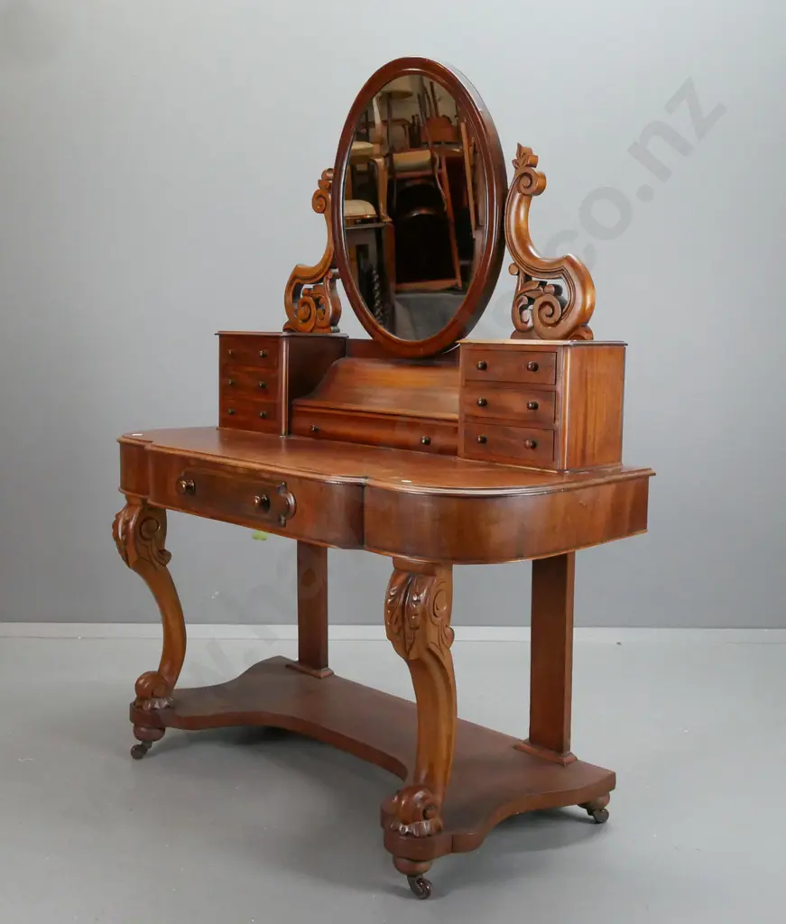 Victorian mahogany dressing table with oval mirror on foliate carved supports - break front top on shaped carved Image 1++