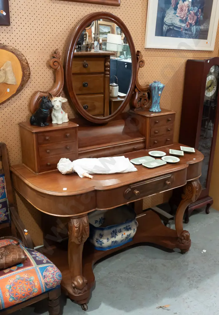 Victorian mahogany dressing table with oval mirror on foliate carved supports - break front top on shaped carved Image 1++