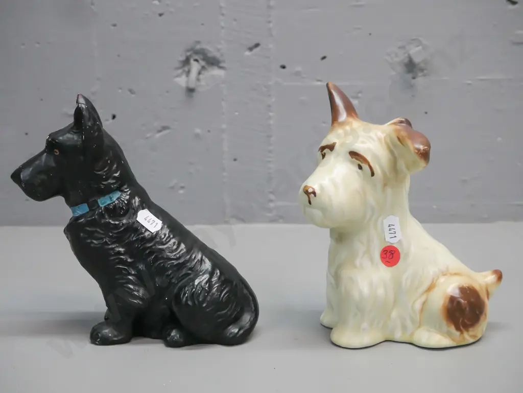 2x ceramic sitting terriers, made by Sylvac, wear to glaze on both, some fretting to black dog, chip on nose of light Image 1++