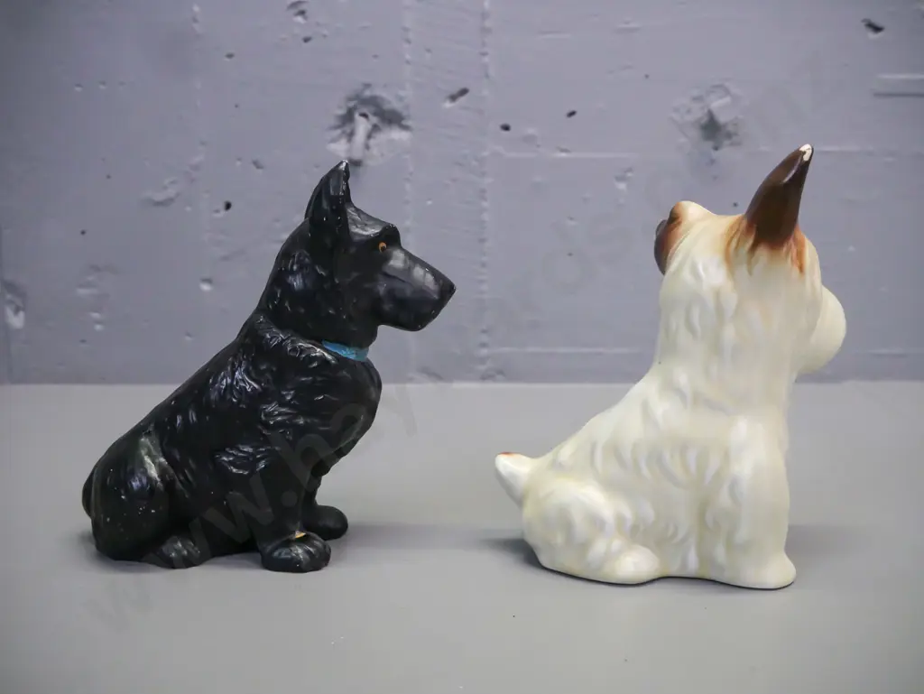 2x ceramic sitting terriers, made by Sylvac, wear to glaze on both, some fretting to black dog, chip on nose of light Image 1++