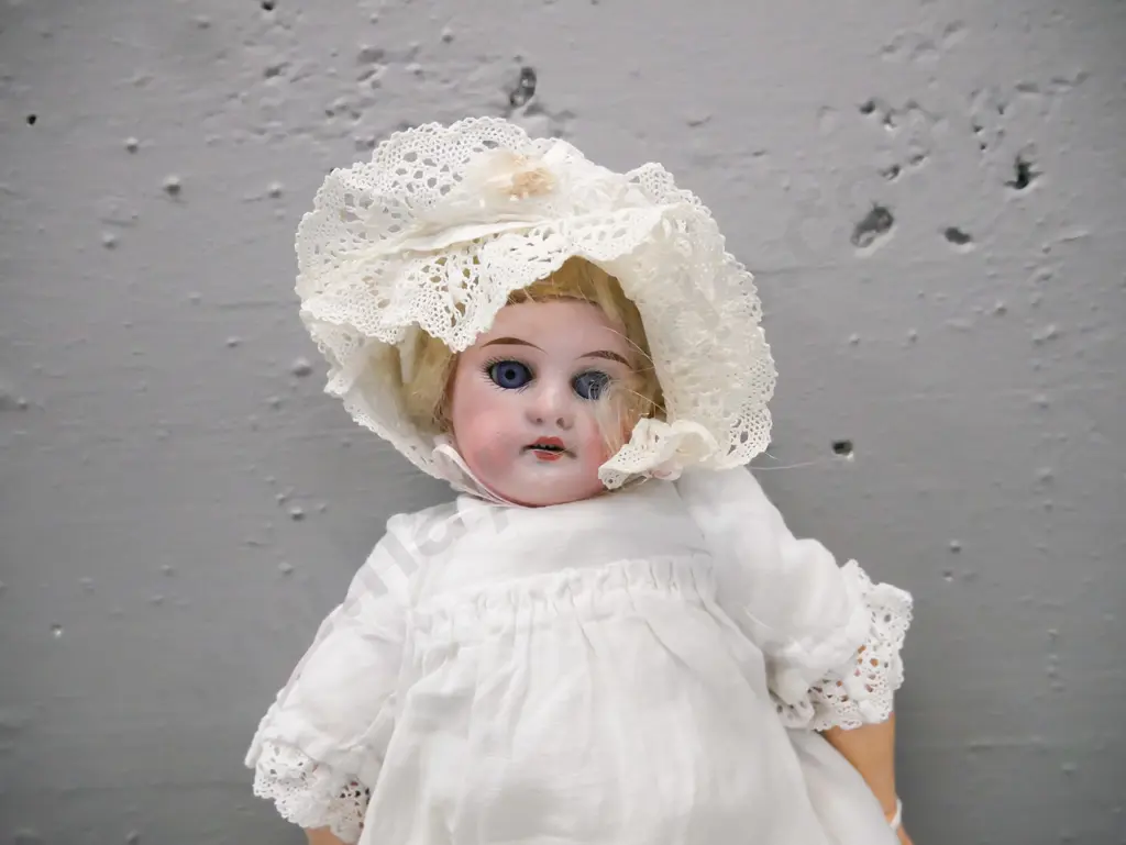 porcelain sleeping doll, Armand Marseille made in Germany, opening/shutting eyes, articulated arms & legs, light stains Image 1++