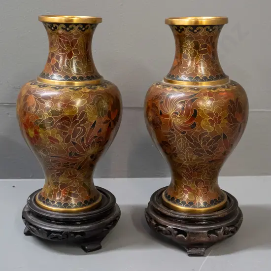pair of Chinese floral cloisonne vases with wooden stands and box - one vase has area of impact damage to enamel.