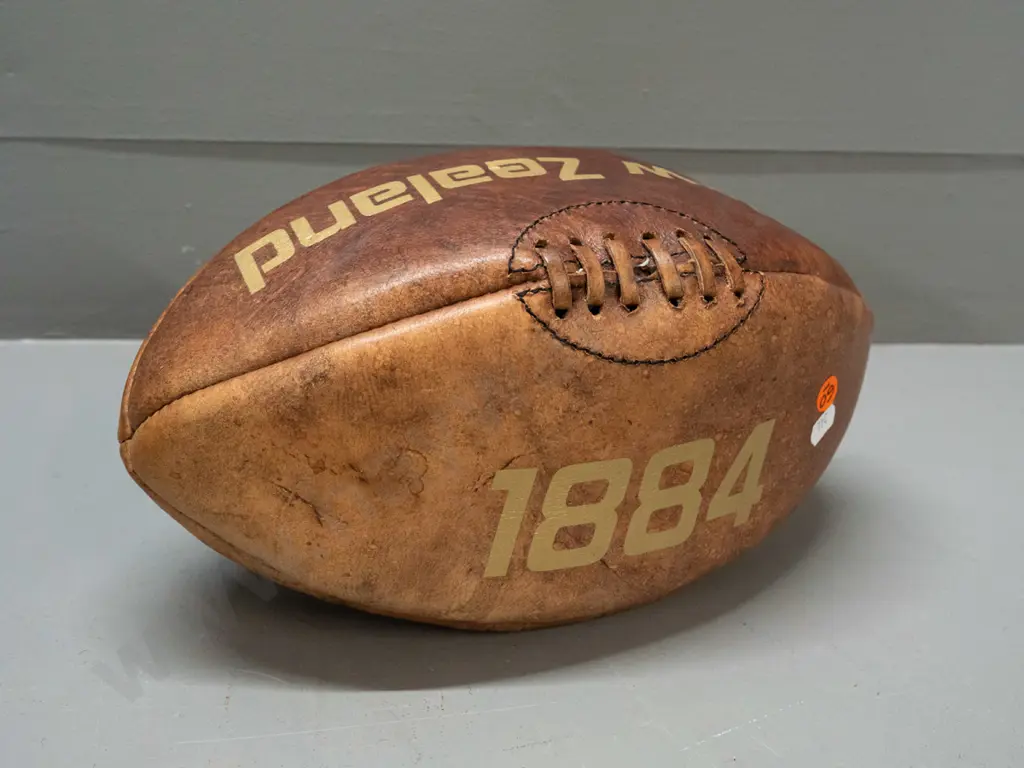 leather rugby ball with gilt "New Zealand" and "1884" markings - some fading to one side L-340 Image 1++