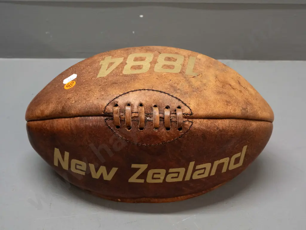 leather rugby ball with gilt "New Zealand" and "1884" markings - some fading to one side L-340 Image 1++