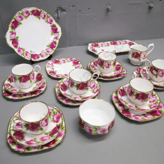 Royal Albert Old English Rose tea set, 6 trios, cake & sandwich plate, cream & sugar, and extra side plate. Cake