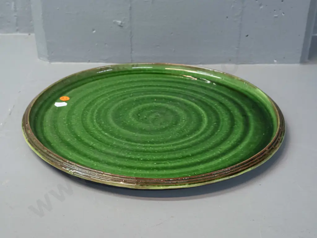 Tony Sly New Zealand studio pottery platter with green swirl pattern - impressed mark on underside - D-360 Image 1++