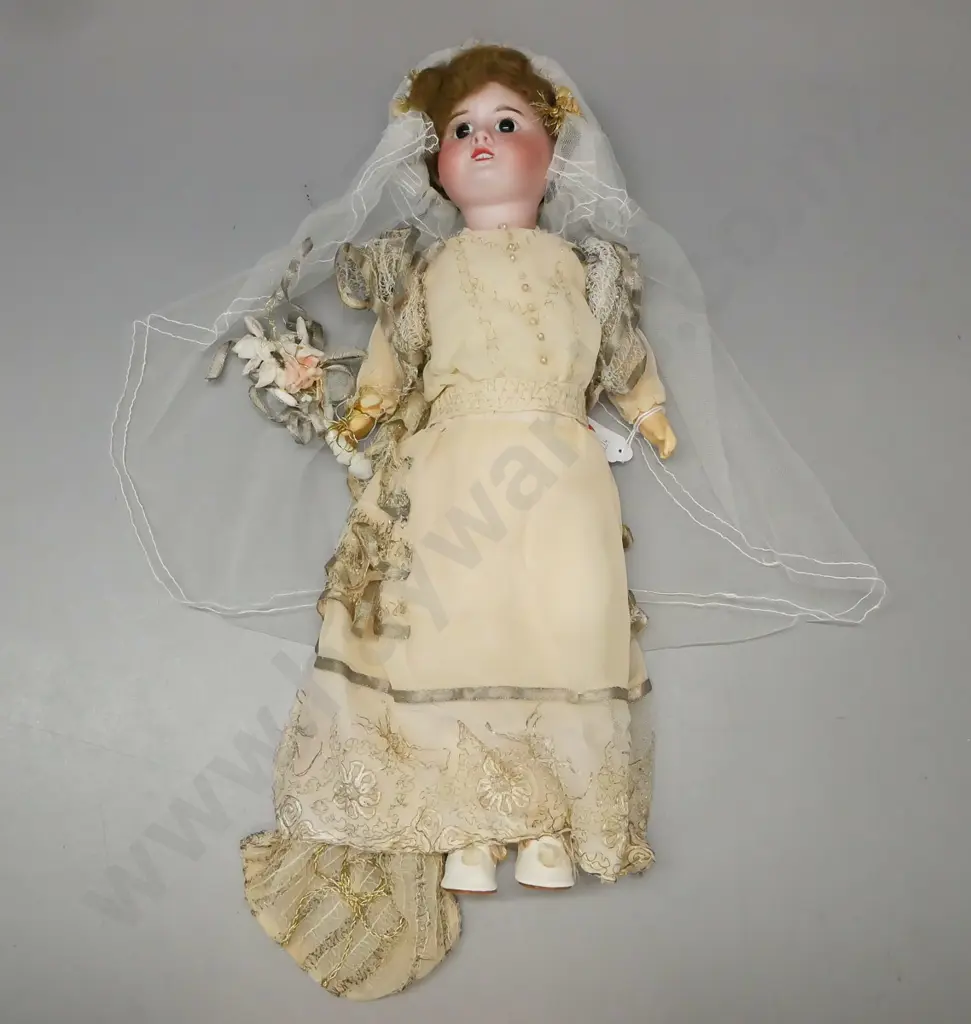 vintage porcelain doll w/ glass eyes in wedding dress, SFBJ Paris, some wear and staining to costume, loose hairpiece. Image 1++