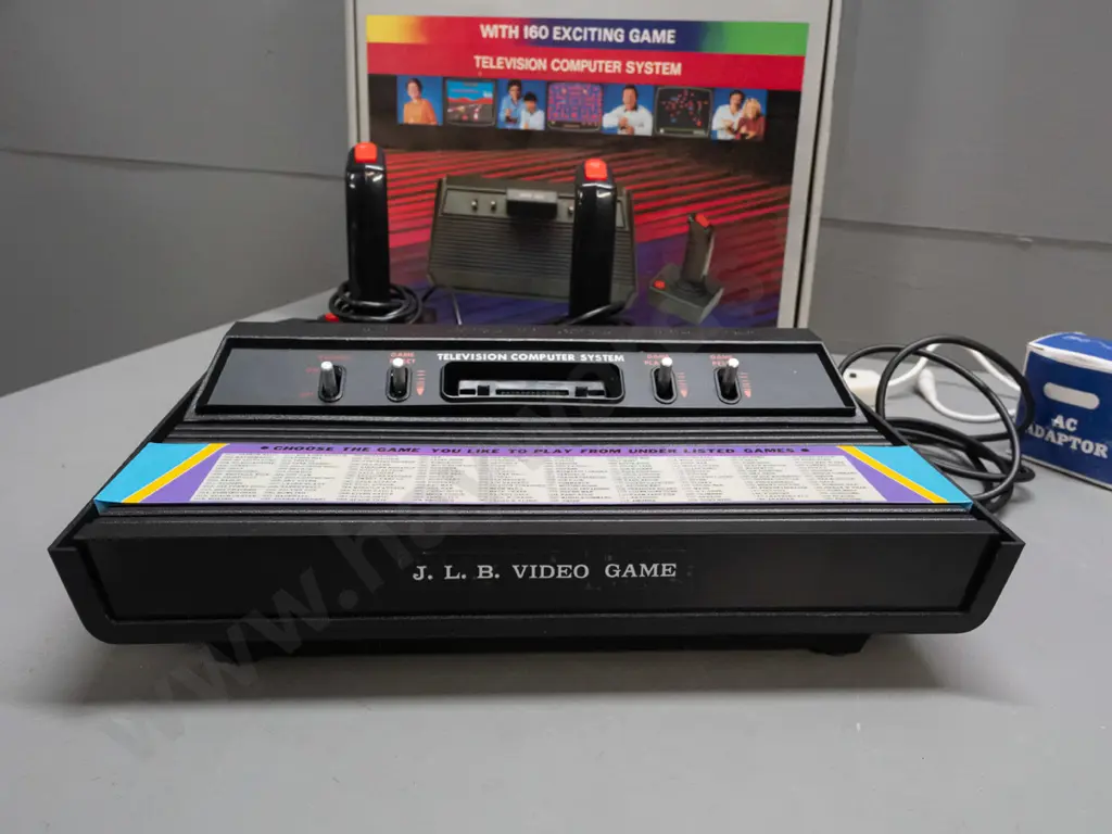 boxed videogame console - marked JLB Video Game, Model 2600 - with cord and 2 controllers - in original box, very good Image 1++