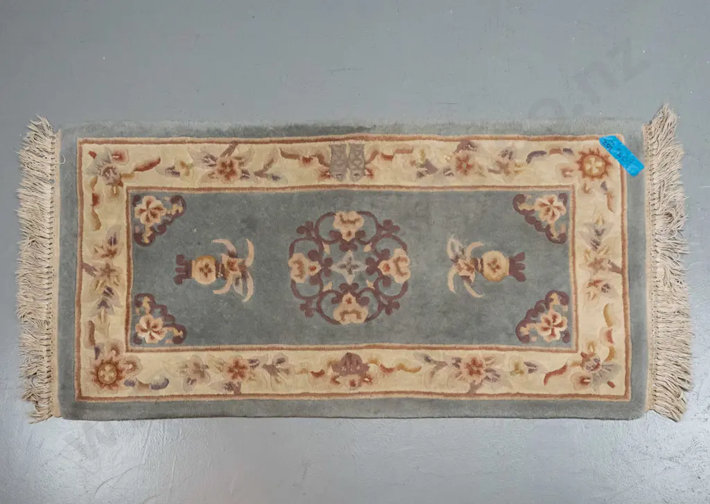 Chinese style wool floor rug - light blue, pink and cream - some damage to fringe, wear & staining L-1400 W-700 Image 1++