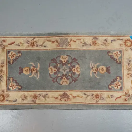 Chinese style wool floor rug - light blue, pink and cream - some damage to fringe, wear & staining L-1400 W-700