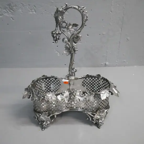 vintage Victorian silver-plated wine-holder w/ grapevine pattern. Ringwear to interior H-310 W-270