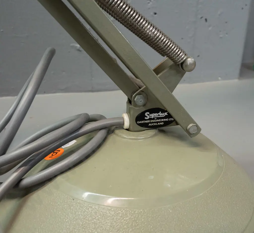 Superluxe anglepoise lamp - light green finish, stem lifts out from base. Going but switch surround has a crack. Minor Image 1++