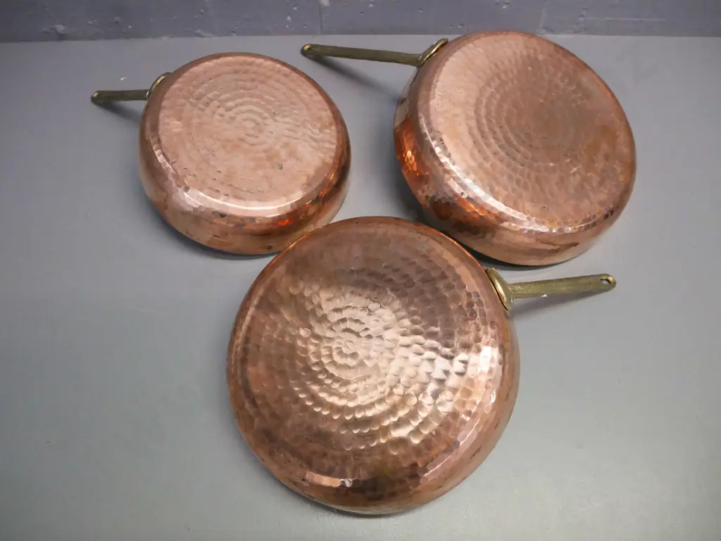 3x beaten copper frying pans w/ white metal interior, cast metal handles, largest L-450 Image 1++