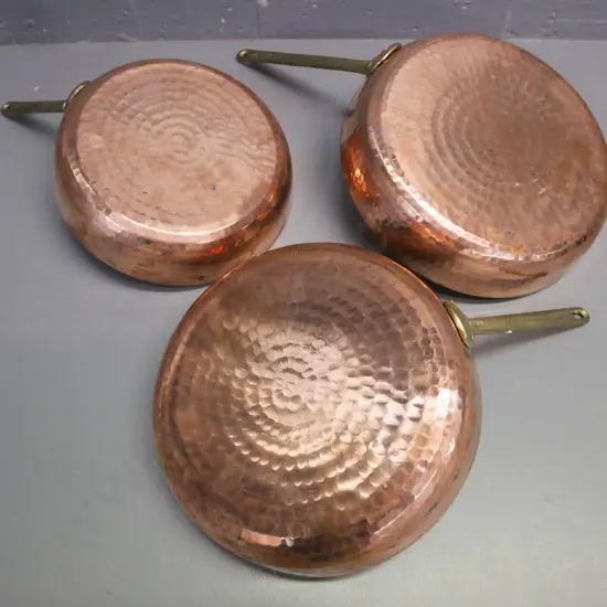 3x beaten copper frying pans w/ white metal interior, cast metal handles, largest L-450