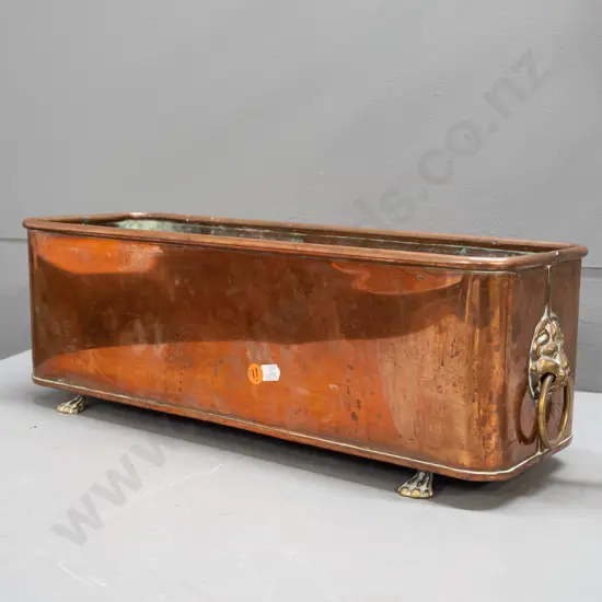 copper planter trough with brass lion's head ring handles and lion's paw feet - marked Hand Made - Made in England -