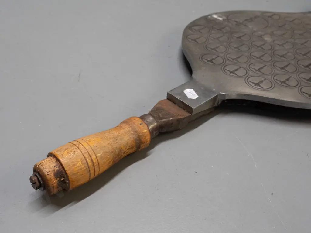 heavy brass and steel communion host press with engraved plate, timber handle, marked H. Kissing Menden. L-750 Image 1++