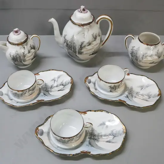 Japanese tea set: tea pot, water jug and bowl, 3x plates & teacups. Depicting scenes of pines waterfall & building