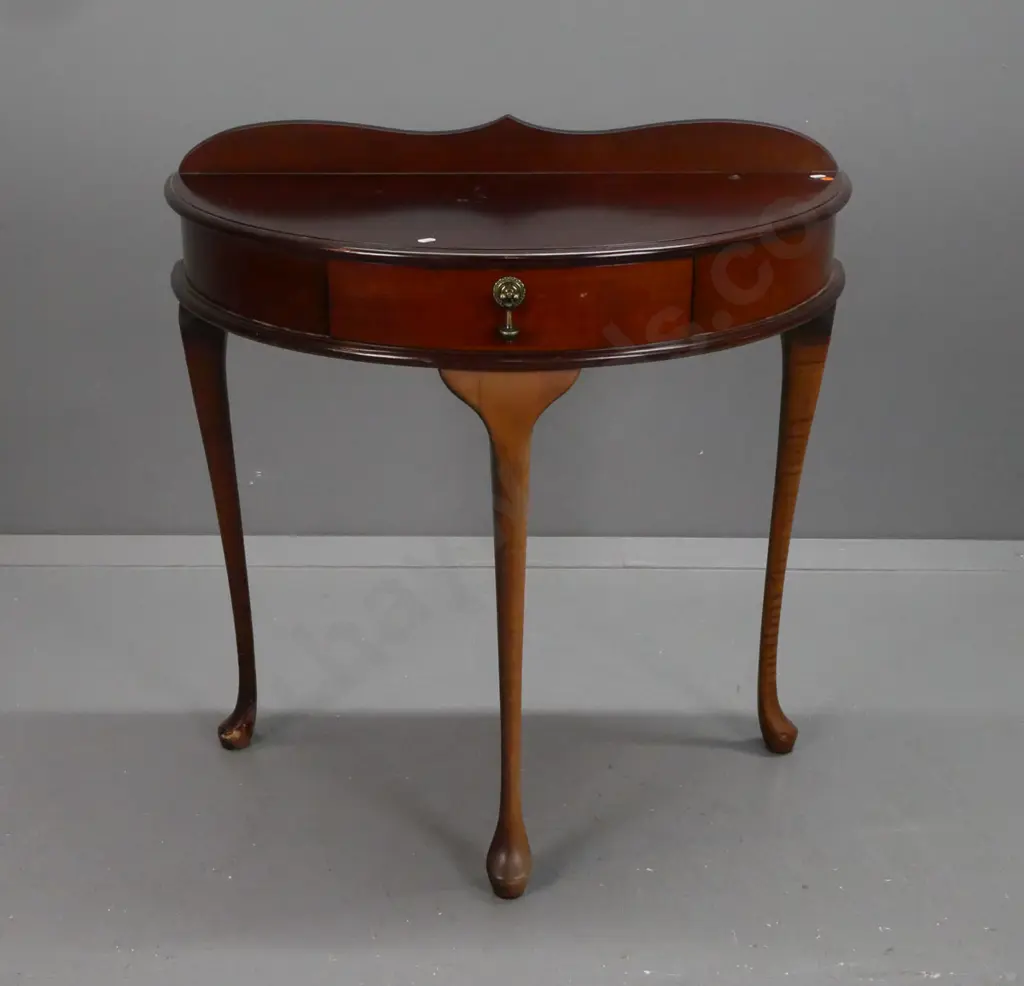 Demi-lune hall or side-table in mahogany & beech w/ shaped upstand, central drawer w/ drop handle, on shaped cabriole Image 1++