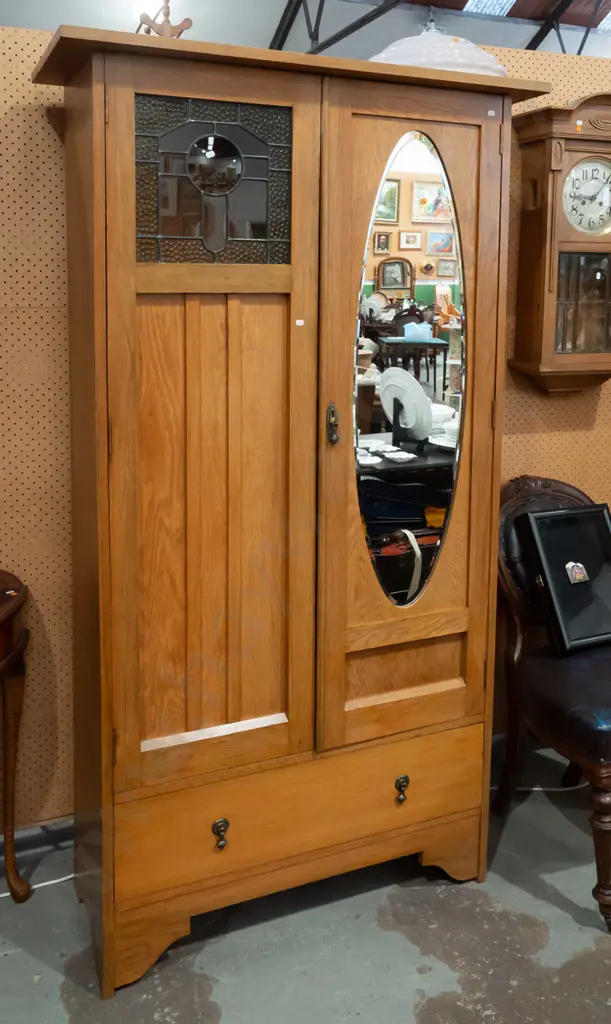 vintage oak 2-door wardrobe with oval bevelled edge mirror in one, small leadlight panel in other above slatted panel, Image 1++