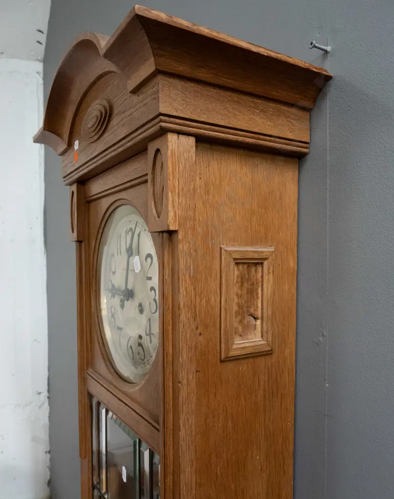 vintage oak-cased chiming wall clock w/ silvered dial marked Stewart Dawson & Co, brass bezel. Bevelled leadlight door, Image 1++