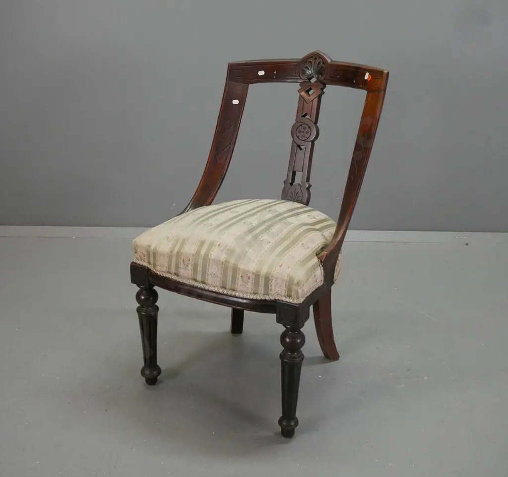 Victorian mahogany saddle-back chair with pierced and carved back splat & top rail, turned & fluted front legs, green & Image 1++