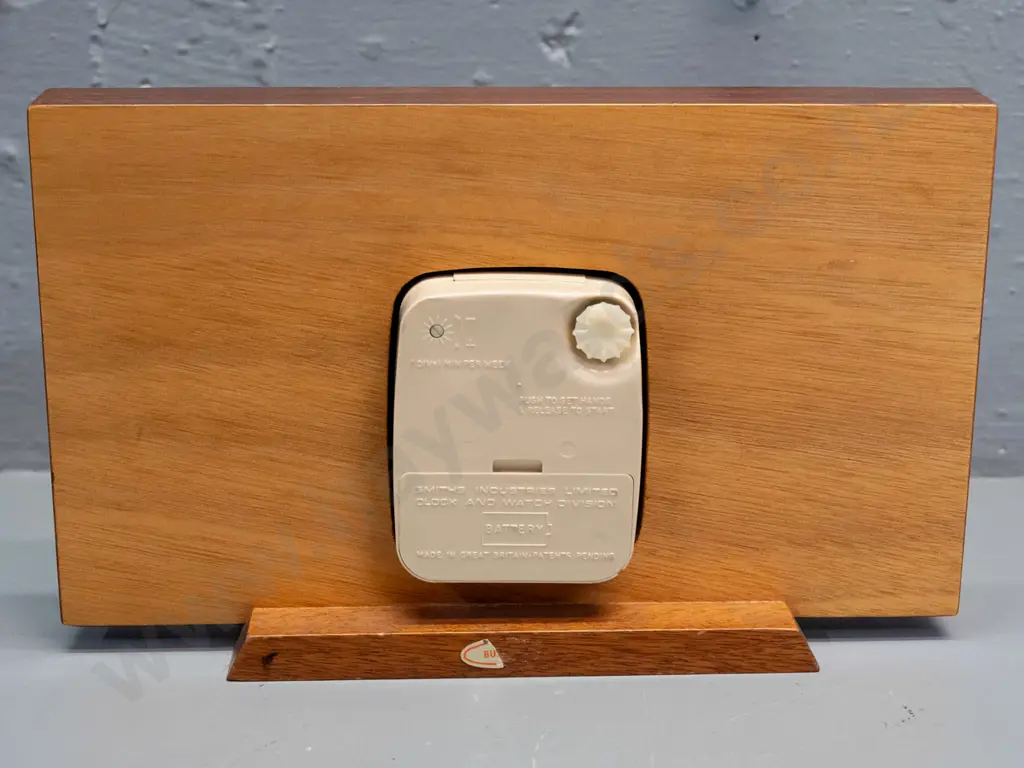 retro Smiths mantel clock with mahogany base, teak veneer and etched brass strapping, plastic-cased C battery movement. Image 1++