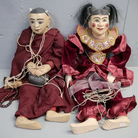 2x wooden marionette-style puppets (Tibetan?) monk & female figure, heads/hands/feet painted timber, stringing tangled