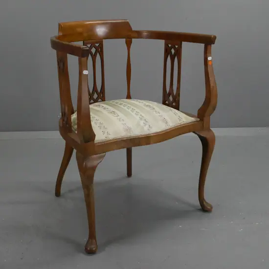 vintage beech Hepplewhite-style tub chair with pierced back splats, sweeping cab legs, w/ green and ivory & floral