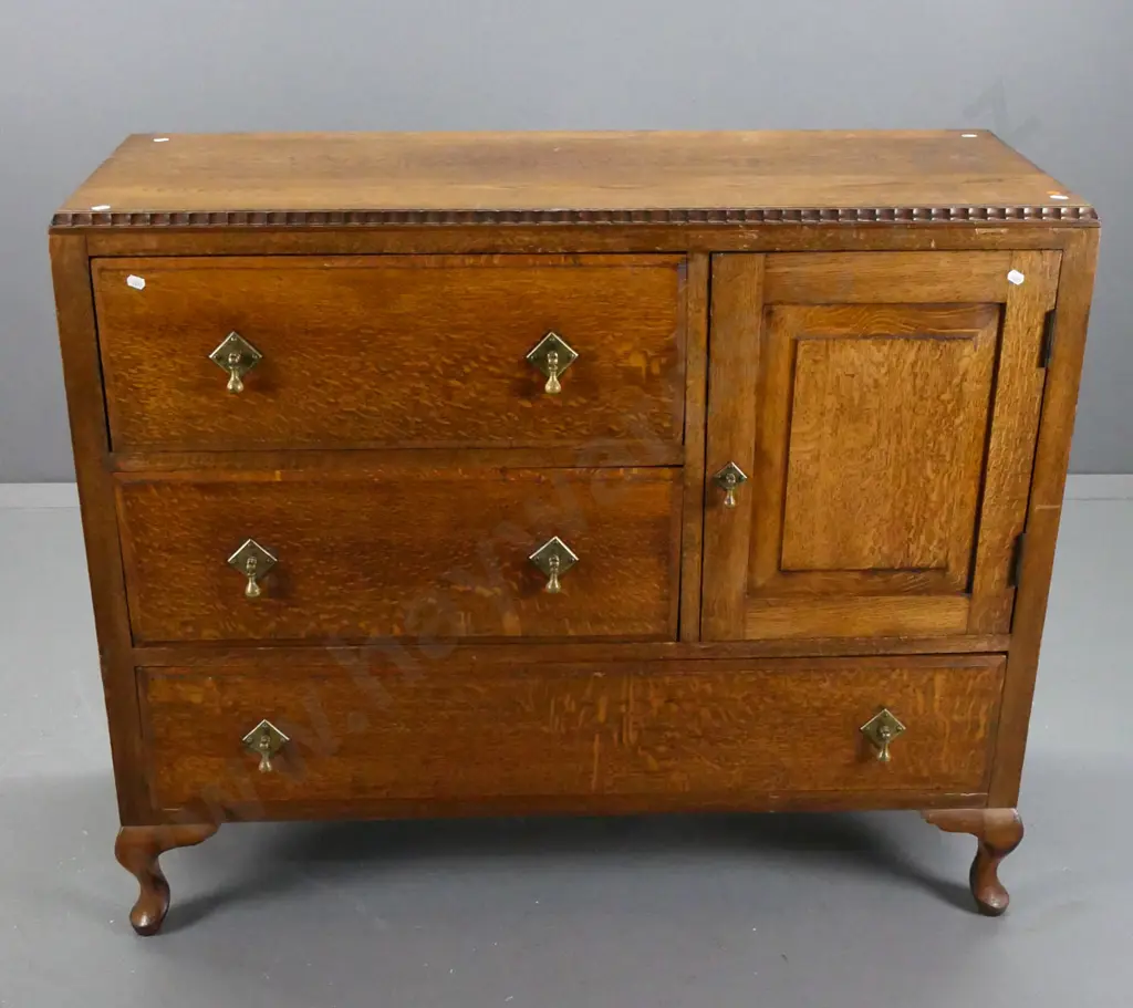 oak art deco buffet sideboard with shaped edge top, panelled sides, panelled door, 4 drawers with brass drop handles Image 1++