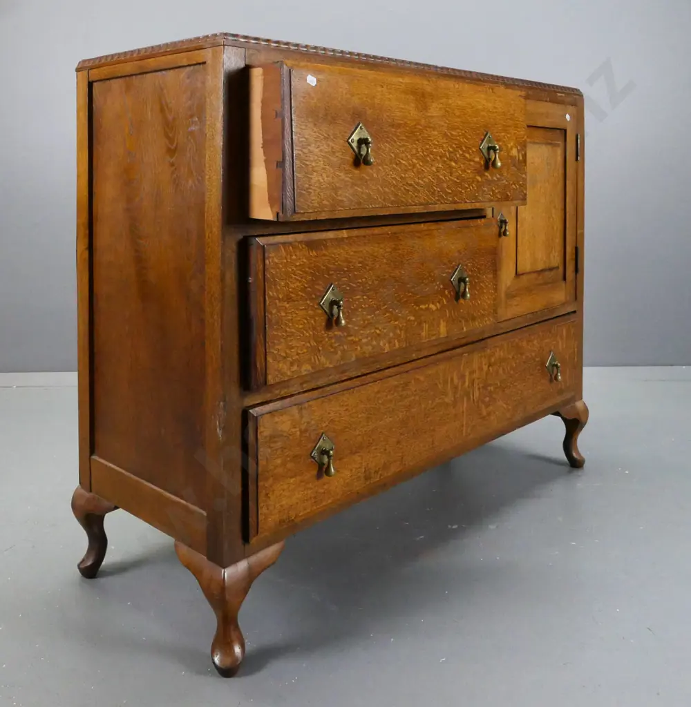 oak art deco buffet sideboard with shaped edge top, panelled sides, panelled door, 4 drawers with brass drop handles Image 1++