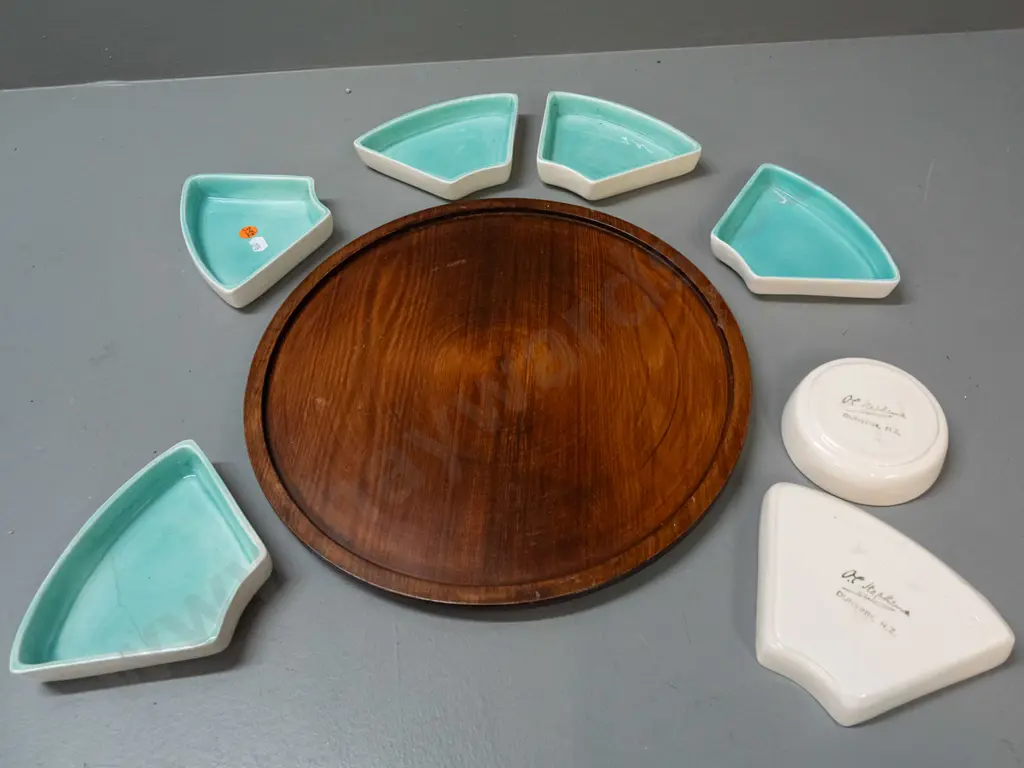 O.C. Stephens pottery serving dish centrepiece with 1 centre and 6 outer segments, all marked and numbered, on a rimu Image 1++