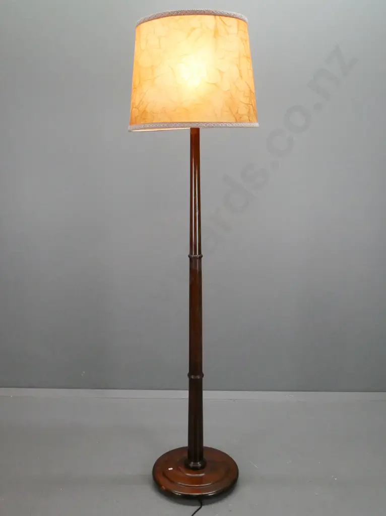 mahogany standard lamp with circular stepped base on 3 turned feet, tapered column with 2 collars, brass cap, marbled Image 1++