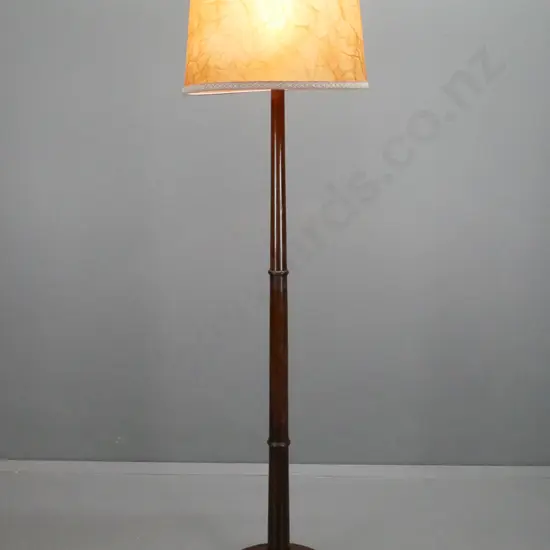 mahogany standard lamp with circular stepped base on 3 turned feet, tapered column with 2 collars, brass cap, marbled
