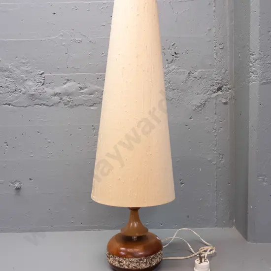 mid-century teak table lamp with turned circular base with inset band of chipped stone, metal column, tall conical shade
