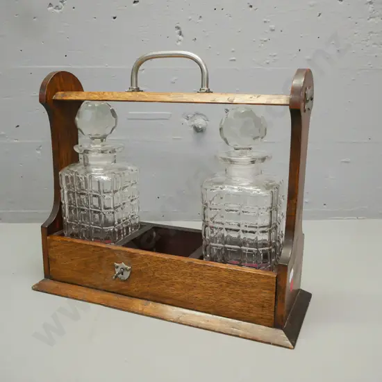 vintage oak decanter set, missing one decanter, square section decoration to decanters, chips to bottom of stoppers and