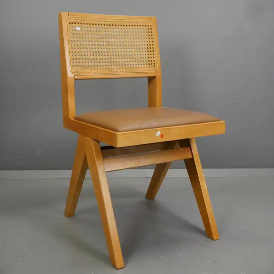 reproduction oak retro-style occasional / side chair with cane back, vinyl seat, A-frame stretcher base. H-830 W-440