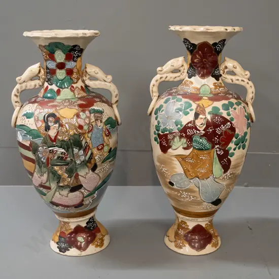 vintage pair of Satsuma earthenware vases with raised enamel decoration, Japanese scenic panels. Some chipping to bases,