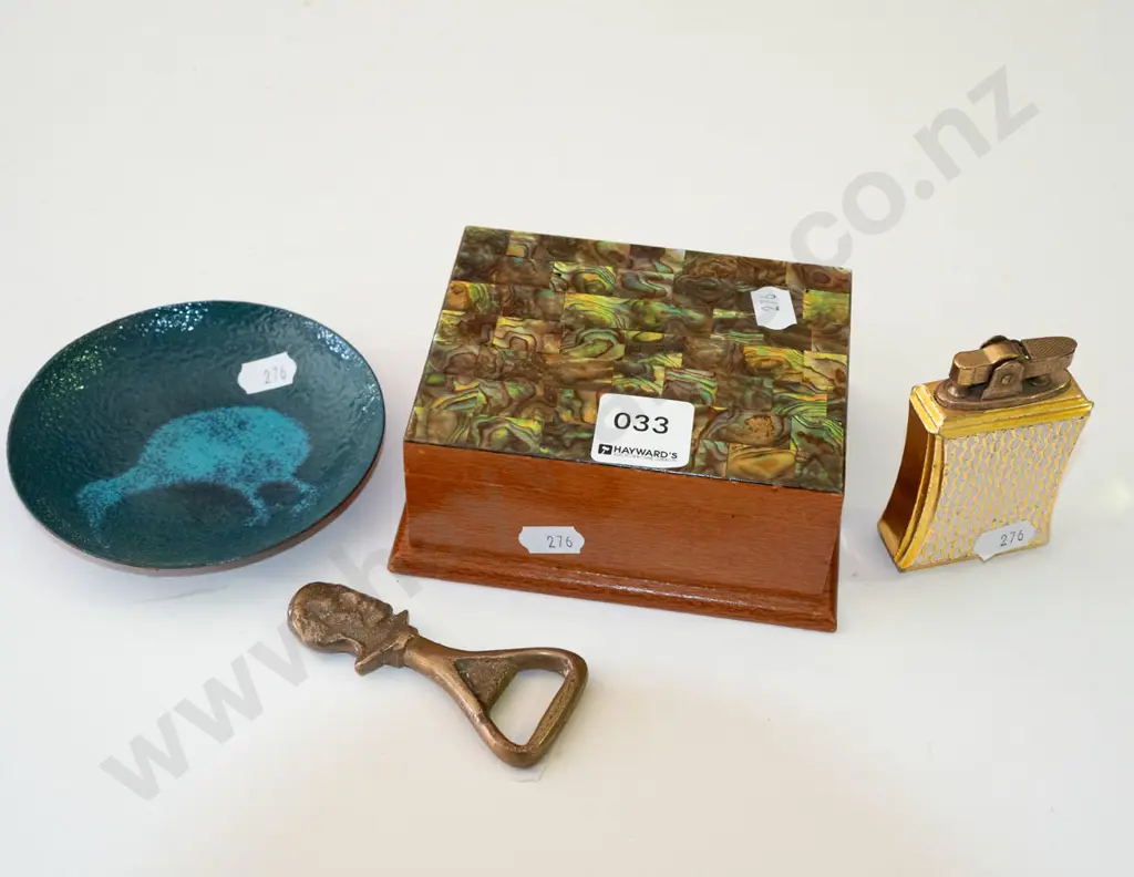 small paua wood trinket box, enamel kiwi dish, lighter & a cast metal bottle opener Image 1++